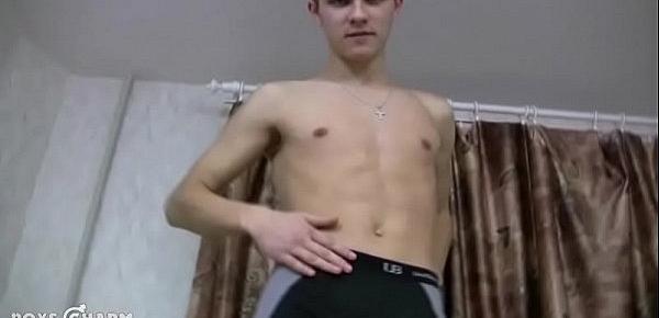  Playful twink strips off revealing his uncut cock